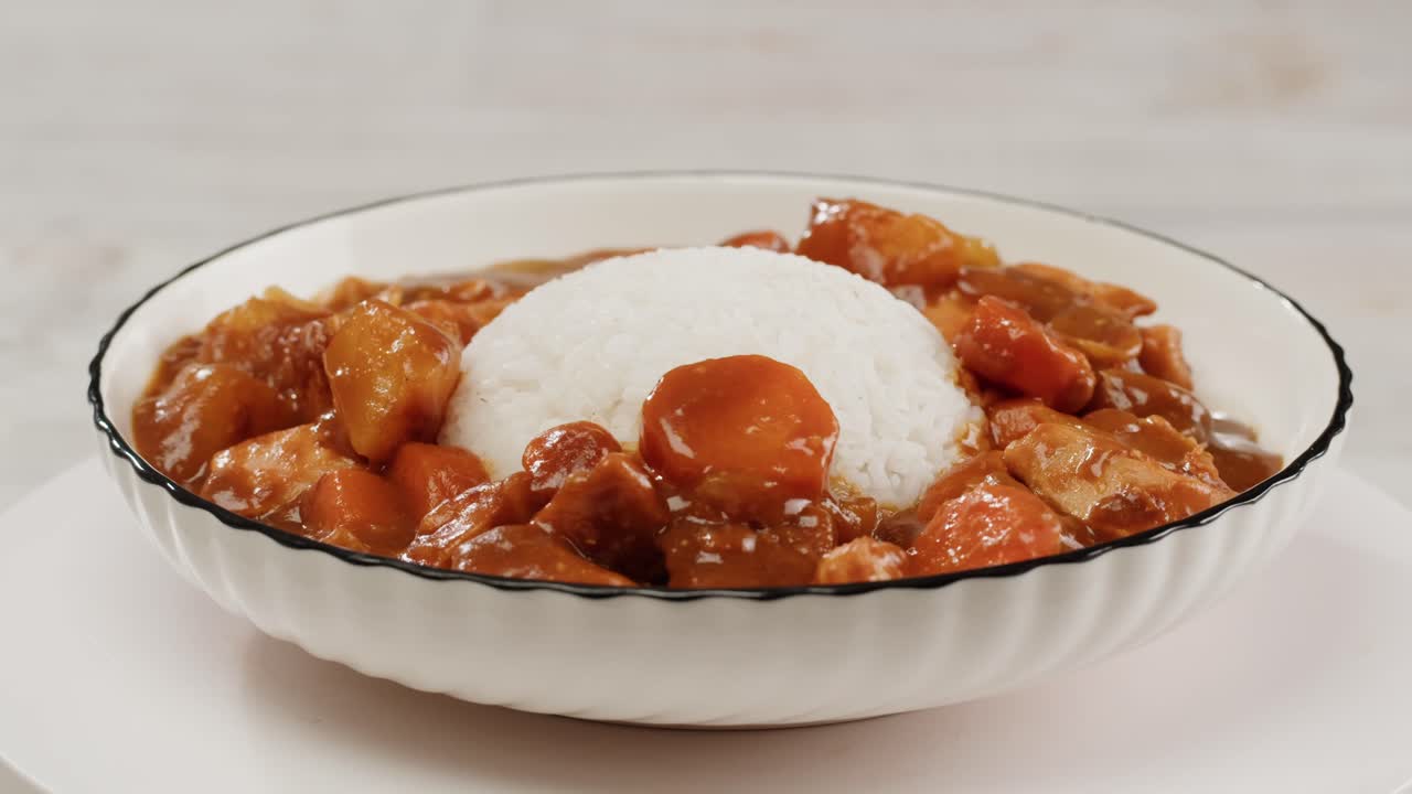 Japanese curry rice with fry pork Tonkatsu, Katsu Kare, Japanese breaded cooking dinner in restaurant, close up macro of asian food