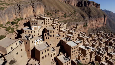 aerial view of a cliffside village in the mountains