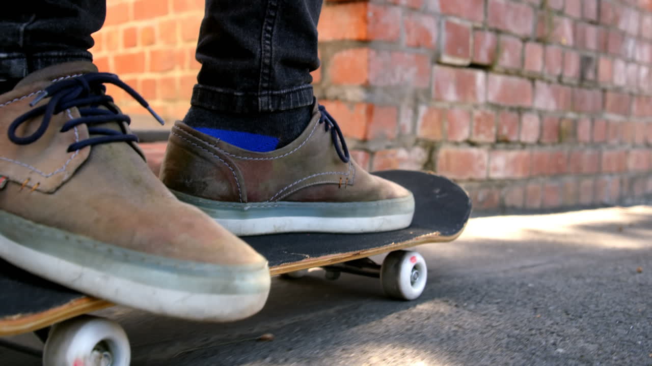 Man skate boarding on street
