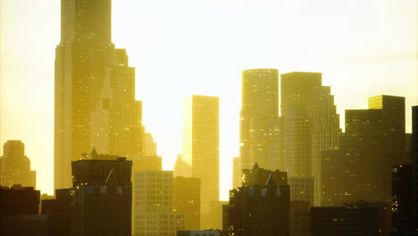 sunset casts golden glow over a vibrant city skyline in evening light
