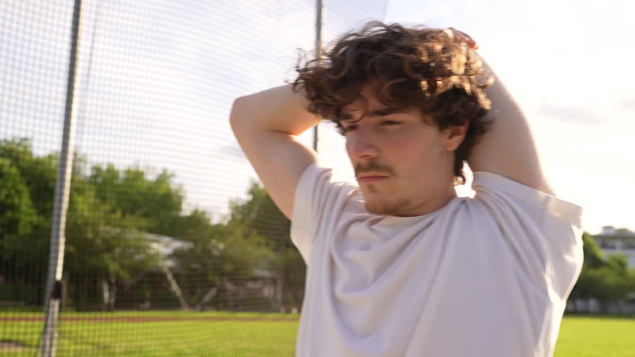 Man stretching outdoors in the park
