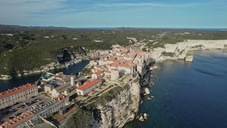 aerial view of small village perched on cliff