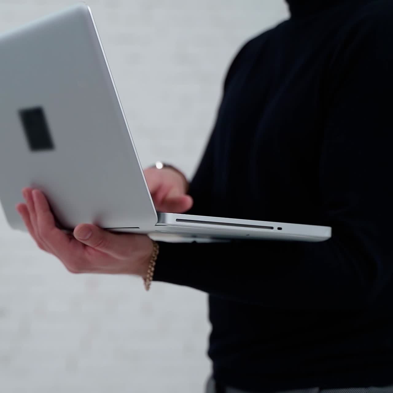 . Young professional businessman. Close up of male hands typing on notebook