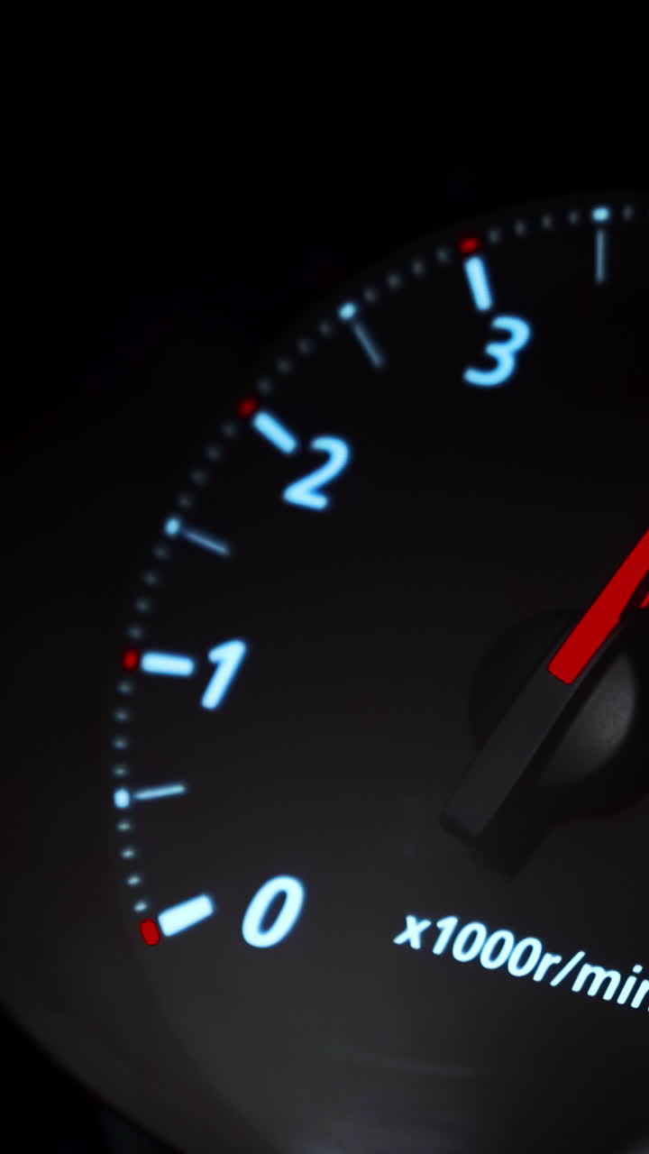 Car Tachometer at Night