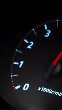 Car Tachometer at Night