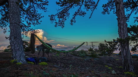 hiker setups hammock on mount olympus in cyprus