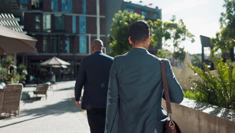 businessmen walking in urban setting