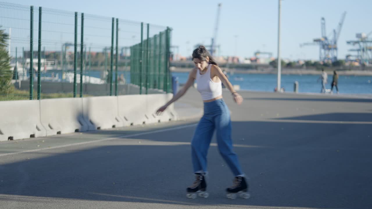 Young Woman Skateboarding in City