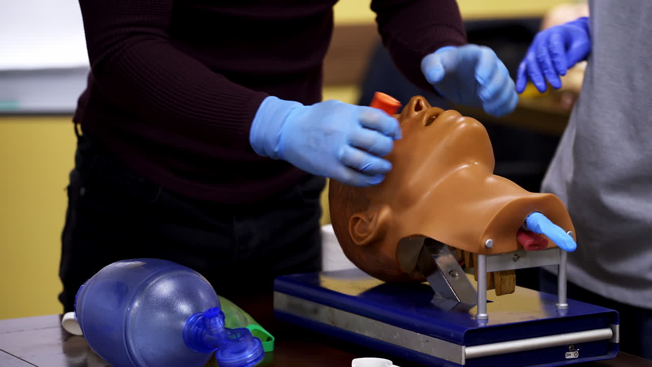 Close-up detail of a training dummy. Medical doll ready for a training. Healthcare and education concept video.
