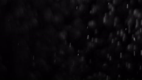 Real-rain-drops-falling-or-snow-4K-alpha-channel-footage.-Heavy-rain-fall,-rainstorm,-snowfall