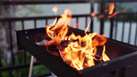 fire burning in a barbecue grill