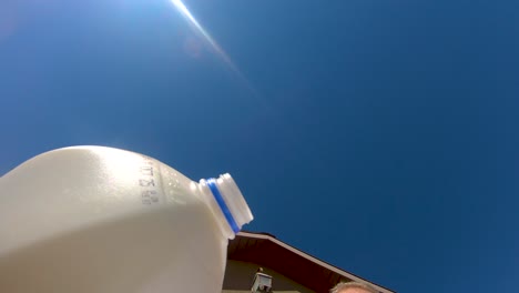 Pouring-a-glass-or-bowl-of-milk-for-cereal