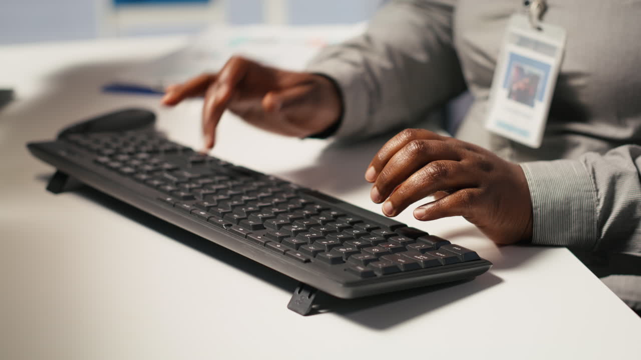 Vertical video Close up of data center admin coding on PC, typing on computer keyboard