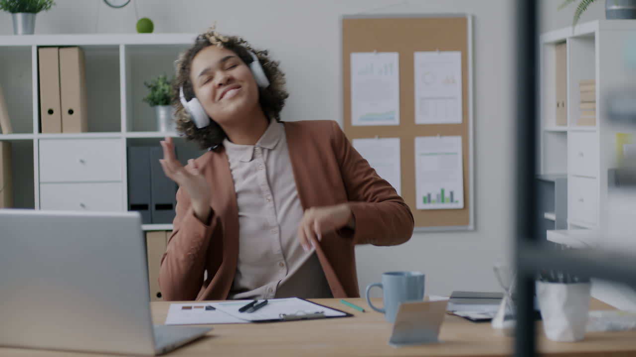 Woman Dancing in the Office