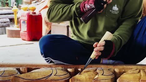 Thai Wood Carver at Work: Intricate Hand Carving Techniques