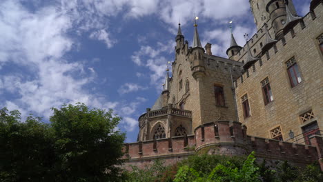 marienburg castle with garden and summer sky background