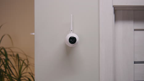 wireless security camera on wall