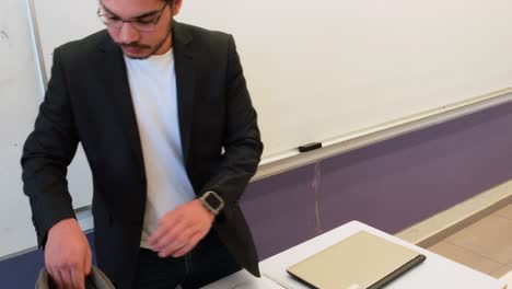 modern academic professional with laptop and bag
