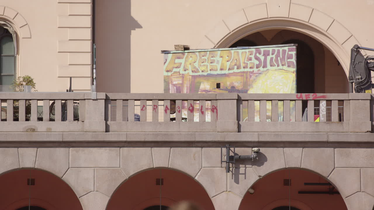 Free Palestine banner displayed at Youngstorget in Oslo in protest to war acts