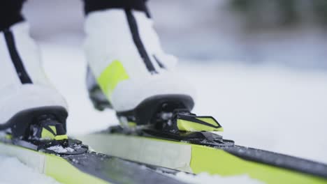 Extreme-close-up-of-skiis-being-locked-in