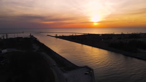 channel of muskegon lake and lake michigan in spring