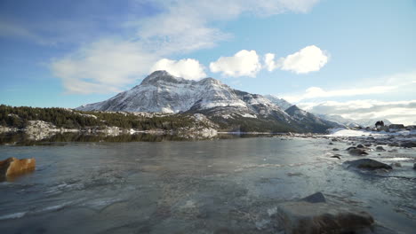 Mountain-and-reflection-during-the-winter-in-Waterton-National-Park-in-Alberta,-Canada