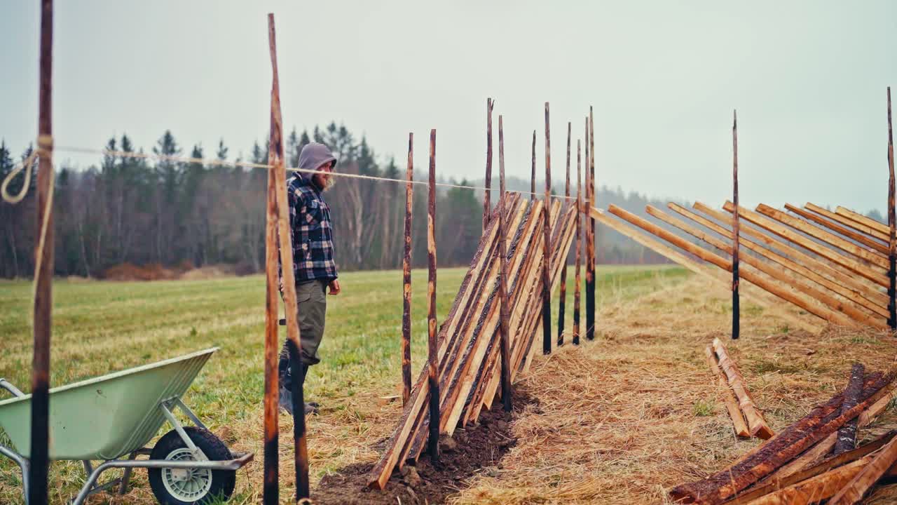 Timelapse Of Man Building A Traditional Norwegian Fence (Skigard)