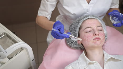 woman getting facial treatment