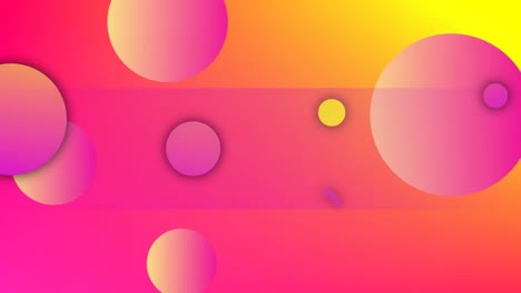 animation of orange, pink and yellow spheres, capsules and rings, on orange and yellow background