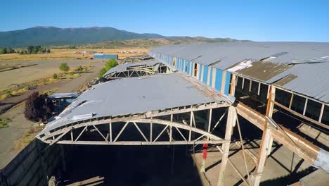 An-vista-aérea-shot-over-an-abandoned-factory-mill-in-Northern-California-2