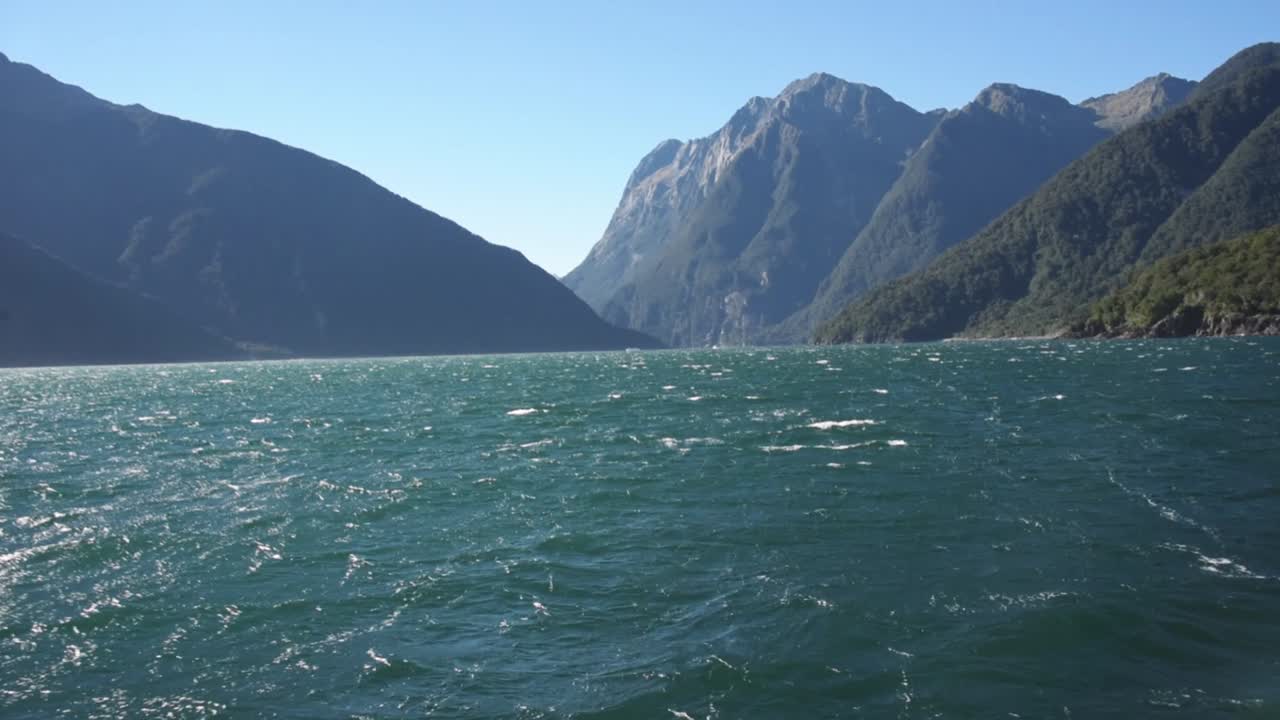 Cruise on the turquoise Tasman sea. Entering the Milford Sound on daytime
