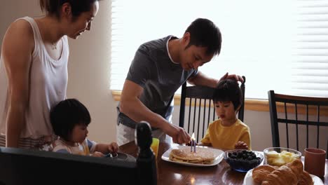 family enjoying time relaxing together at home