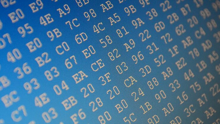 Code on a blue background. Digital coding. Hexadecimal program code on screen. Animated background of moving binary code numbers