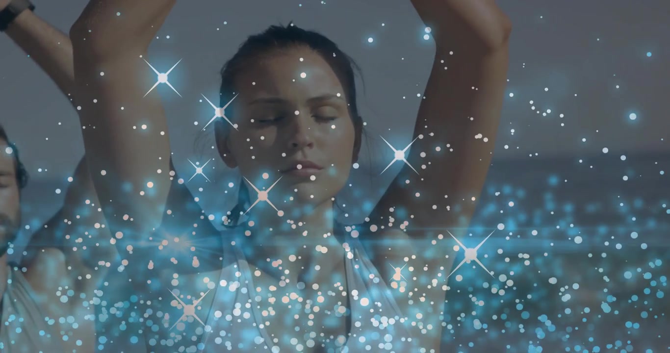 Group Meditating with Eyes Closed and Sparkling Blue Energy Overlay