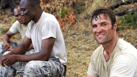 fit men interacting with each other during fitness training exercise