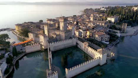 Aerial-view-Sirmione-mediteranean-historical-sightseeing-town-in-italy-on-lake-garda