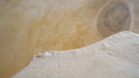 edges-of-puff-pastry-on-wooden-board