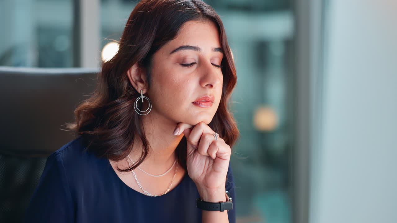 Portrait of a thoughtful businesswoman in an office setting