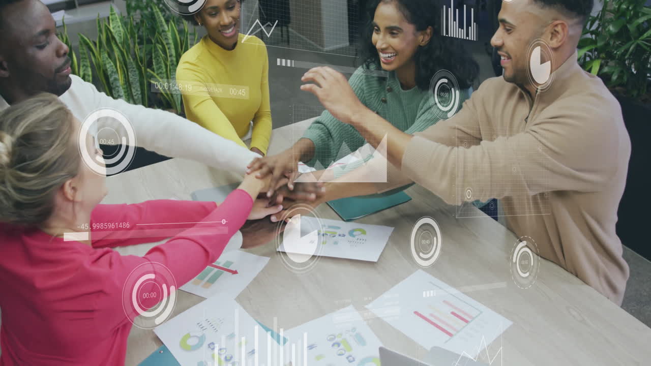 Animation of data processing over diverse male and female colleagues hand stacking at casual meeting
