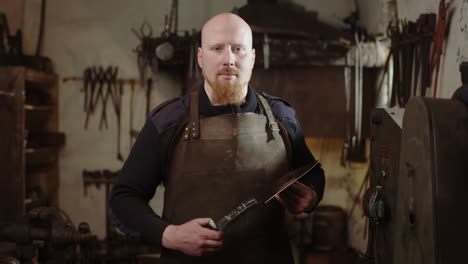 blacksmith portrait in his workshop