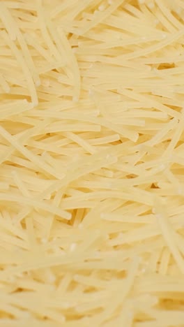 A Closeup Shot of Dry Spaghetti Noodles Perfect for Various Culinary Uses and Dishes this Image Shows a Closeup of Dry Spaghetti Noodles Perfect for Culinary Illustrations and Food Projects