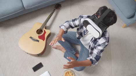 tiener die thuis een virtual reality-spel speelt