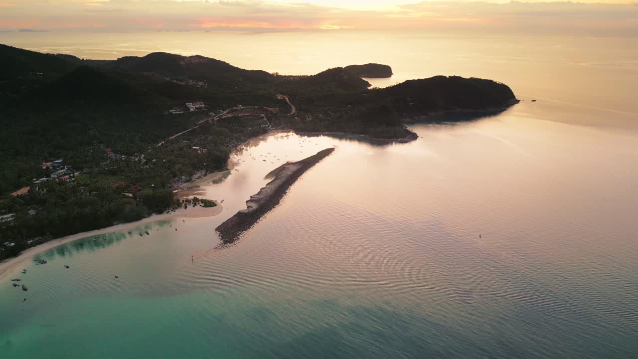 Ko Pha-ngan island landscape, Aerial view fly above Thailand's travel lush nature during Sunset
