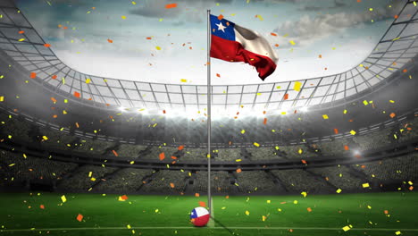 confeti cayendo sobre la bandera de chile contra el estadio deportivo en el fondo