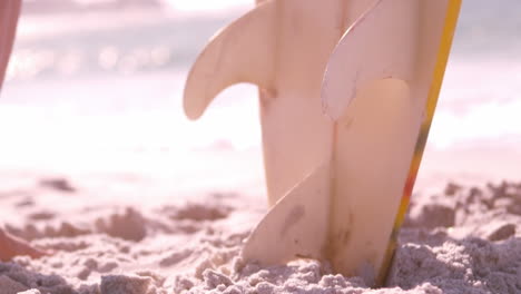 a man is taking his surfboard
