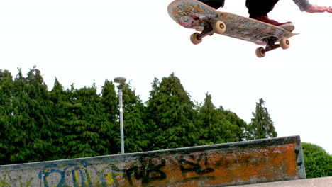 Young-skateboarder-skating-the-outdoor-skatepark