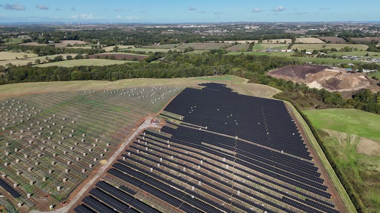 Birds eye view drone aerial Rows of solar farm renewable energy panels photovoltaic green grid sustainable clean power plant eco natural resources