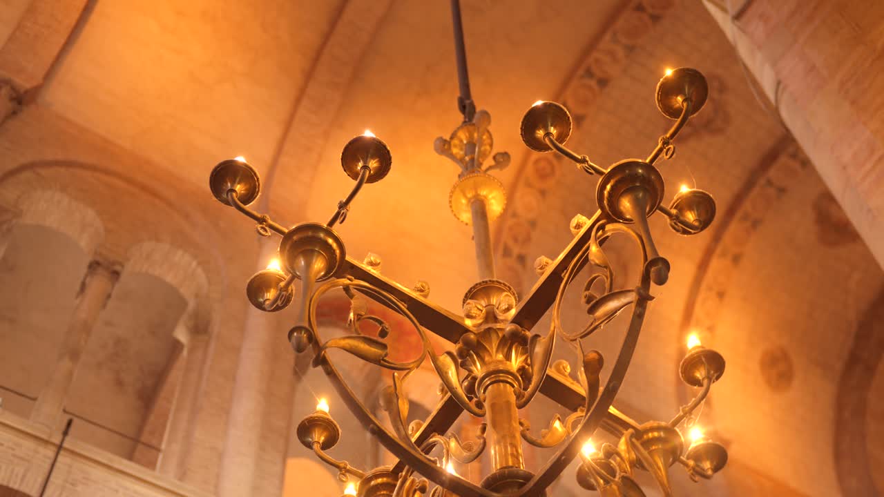 Closeup view of chandelier inside Basilica of Saint-Sernin in Toulouse, France