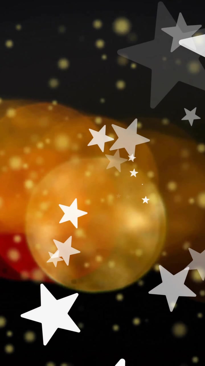 Animazione di stelle bianche su punti luce arancioni e gialli su sfondo nero
