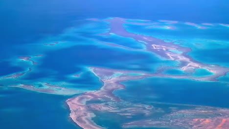 aerial tracking shot of sandbanks in ras mohammed nature reserve, sunny egypt